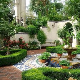 Upravená záhrada s fontánou Jana Grisanti
